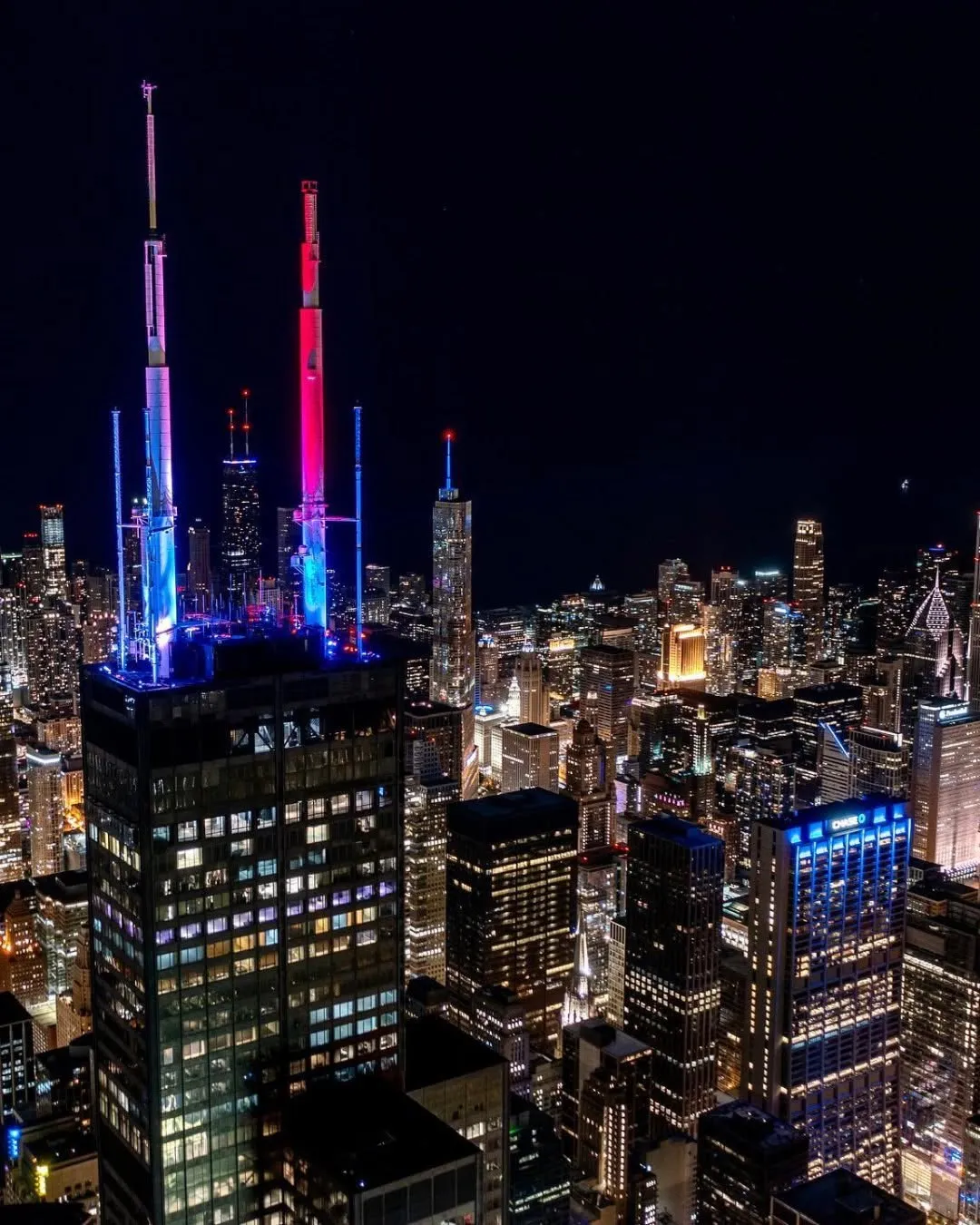 Willis Tower lit red, white, and blue in Chicago, IL